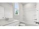 Bright bathroom featuring a bathtub shower combo and white vanity at 117 Osprey Ridge Ln, Summerville, SC 29483