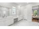 Bright bathroom with double vanity, a walk-in shower, and marble flooring at 117 Osprey Ridge Ln, Summerville, SC 29483