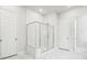 Modern bathroom with frameless glass shower, and marble tile flooring at 117 Osprey Ridge Ln, Summerville, SC 29483