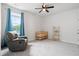 Bedroom with comfortable recliner, crib, and natural light at 117 Osprey Ridge Ln, Summerville, SC 29483