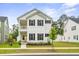 Beautiful two-story home with a cozy porch and well-maintained yard at 117 Osprey Ridge Ln, Summerville, SC 29483