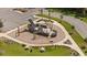 A creative whale-themed playground with a slide, climbing features, picnic tables and open space for children to enjoy at 117 Osprey Ridge Ln, Summerville, SC 29483