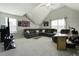Upstairs Bonus Room features vaulted ceilings, carpet flooring, and natural light at 1209 Hammrick Ln, Johns Island, SC 29455