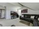 Bonus room with TV, media center, and L-shaped leather couch at 1209 Hammrick Ln, Johns Island, SC 29455