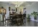 Elegant dining room with rich wood table, decorative artwork, and modern accents at 1209 Hammrick Ln, Johns Island, SC 29455