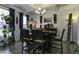 Stylish dining room with hardwood floors, elegant chandelier, and sophisticated decor at 1209 Hammrick Ln, Johns Island, SC 29455