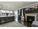 Bright living room featuring a fireplace and kitchen island, perfect for modern living at 1209 Hammrick Ln, Johns Island, SC 29455