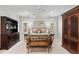 Spacious bedroom with a decorative bed, wooden furniture, and ample natural light from multiple windows at 121 W Shipyard Rd, Mount Pleasant, SC 29464