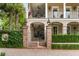 Charming brick gated entrance with landscaped walls that lead to a beautiful home at 121 W Shipyard Rd, Mount Pleasant, SC 29464