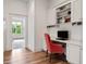Office with built-in shelves and drawers, and a doorway to an additional room at 121 W Shipyard Rd, Mount Pleasant, SC 29464