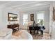 Living room includes a piano, recessed lighting, and wood floors at 121 W Shipyard Rd, Mount Pleasant, SC 29464