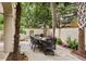 Inviting outdoor dining area with a wrought iron table and chairs, perfect for al fresco meals at 121 W Shipyard Rd, Mount Pleasant, SC 29464
