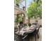 Outdoor dining with patio, chairs, a table, and a fountain in a private setting at 121 W Shipyard Rd, Mount Pleasant, SC 29464
