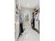 Organized walk-in closet features custom shelving and storage around a window with outside views at 121 W Shipyard Rd, Mount Pleasant, SC 29464
