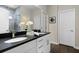 Modern bathroom featuring double sinks, sleek cabinetry, and a large mirror at 1221 Lois Allen Rd, Johns Island, SC 29455
