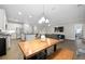 Open-concept living space featuring a well-equipped kitchen, a dining area, and a cozy living room at 1221 Lois Allen Rd, Johns Island, SC 29455