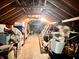Unfinished attic space with exposed rafters and ample storage, offering potential for customization at 1325 Edward Dr, Moncks Corner, SC 29461