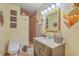 Bathroom features a modern vanity, walk-in shower with tiled walls, and unique decorative accents at 1325 Edward Dr, Moncks Corner, SC 29461