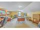 Spacious bonus room with ample natural light, flexible layout, and neutral carpeting at 1325 Edward Dr, Moncks Corner, SC 29461