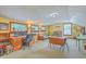 Bright bonus room with multiple windows, a comfortable seating area, and a work space at 1325 Edward Dr, Moncks Corner, SC 29461