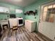 Functional laundry room with a washer, dryer, utility sink, and ample space for storage and cleaning supplies at 1325 Edward Dr, Moncks Corner, SC 29461