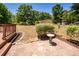 Outdoor space features mature trees, a patio area, and a bird bath, perfect for relaxation at 133 Tall Spruce Rd, Moncks Corner, SC 29461