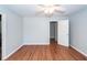 Bedroom with hardwood floors, ceiling fan, and ample natural light at 133 Tall Spruce Rd, Moncks Corner, SC 29461
