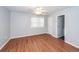 Bright bedroom with hardwood floors, ceiling fan and a window at 133 Tall Spruce Rd, Moncks Corner, SC 29461