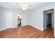 A well-lit bedroom with hardwood floors and a ceiling fan at 133 Tall Spruce Rd, Moncks Corner, SC 29461