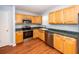 Well-lit kitchen with stainless steel appliances and bright cabinetry at 133 Tall Spruce Rd, Moncks Corner, SC 29461