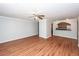 Open concept living room with hardwood floors adjacent to the kitchen at 133 Tall Spruce Rd, Moncks Corner, SC 29461