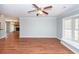 Inviting living room showcasing beautiful flooring, a cozy fireplace, and ample space for relaxation and entertaining at 133 Tall Spruce Rd, Moncks Corner, SC 29461