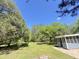 Expansive and well-manicured backyard offers space for recreation and gardening at 1425 Risher Mountain Rd, Walterboro, SC 29488