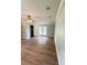 Large bedroom has wood-look floors, a closet, and French doors to outside at 1425 Risher Mountain Rd, Walterboro, SC 29488