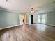 Large bedroom with a ceiling fan, French doors, and doorway to another room at 1425 Risher Mountain Rd, Walterboro, SC 29488