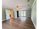 Large bedroom features ceiling fan, French doors, and doorway to another room at 1425 Risher Mountain Rd, Walterboro, SC 29488
