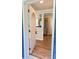 Welcoming entryway leading to the kitchen with wood-look floors at 1425 Risher Mountain Rd, Walterboro, SC 29488