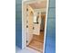 Inviting entryway with stylish wood-look floors and view into kitchen at 1425 Risher Mountain Rd, Walterboro, SC 29488