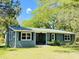 Exterior of the home featuring a new roof, paint, landscaping and a view of the home number at 1425 Risher Mountain Rd, Walterboro, SC 29488