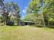 Inviting single-story home with mature landscaping and a well-maintained green lawn at 1425 Risher Mountain Rd, Walterboro, SC 29488