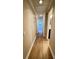 Hallway with hardwood floors and neutral walls with a view of other rooms at 1425 Risher Mountain Rd, Walterboro, SC 29488