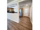 View of the sink and stainless steel refrigerator in an updated kitchen at 1425 Risher Mountain Rd, Walterboro, SC 29488