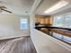 Bright kitchen features wooden cabinets, dark countertops, stainless steel appliances, and lots of natural light at 1425 Risher Mountain Rd, Walterboro, SC 29488
