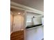 View of the black granite breakfast bar that separates the living room and entryway at 1425 Risher Mountain Rd, Walterboro, SC 29488