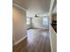 Spacious living room features a ceiling fan and durable wood-look floors at 1425 Risher Mountain Rd, Walterboro, SC 29488