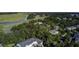 This aerial shot exhibits the community's lush landscaping and peaceful marsh surroundings at 148 Cowrie Ct, Mount Pleasant, SC 29464