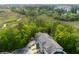 Scenic aerial view of townhomes backing up to a marsh with mature trees, offering privacy and natural beauty at 148 Cowrie Ct, Mount Pleasant, SC 29464