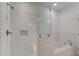 Modern bathroom with a glass shower, white subway tile and a relaxing soaking tub at 148 Cowrie Ct, Mount Pleasant, SC 29464