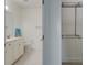 View of a bathroom featuring a vanity, toilet and a large closet on the side at 148 Cowrie Ct, Mount Pleasant, SC 29464