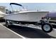 A white boat is securely mounted on a trailer, ready for water adventures at 148 Cowrie Ct, Mount Pleasant, SC 29464